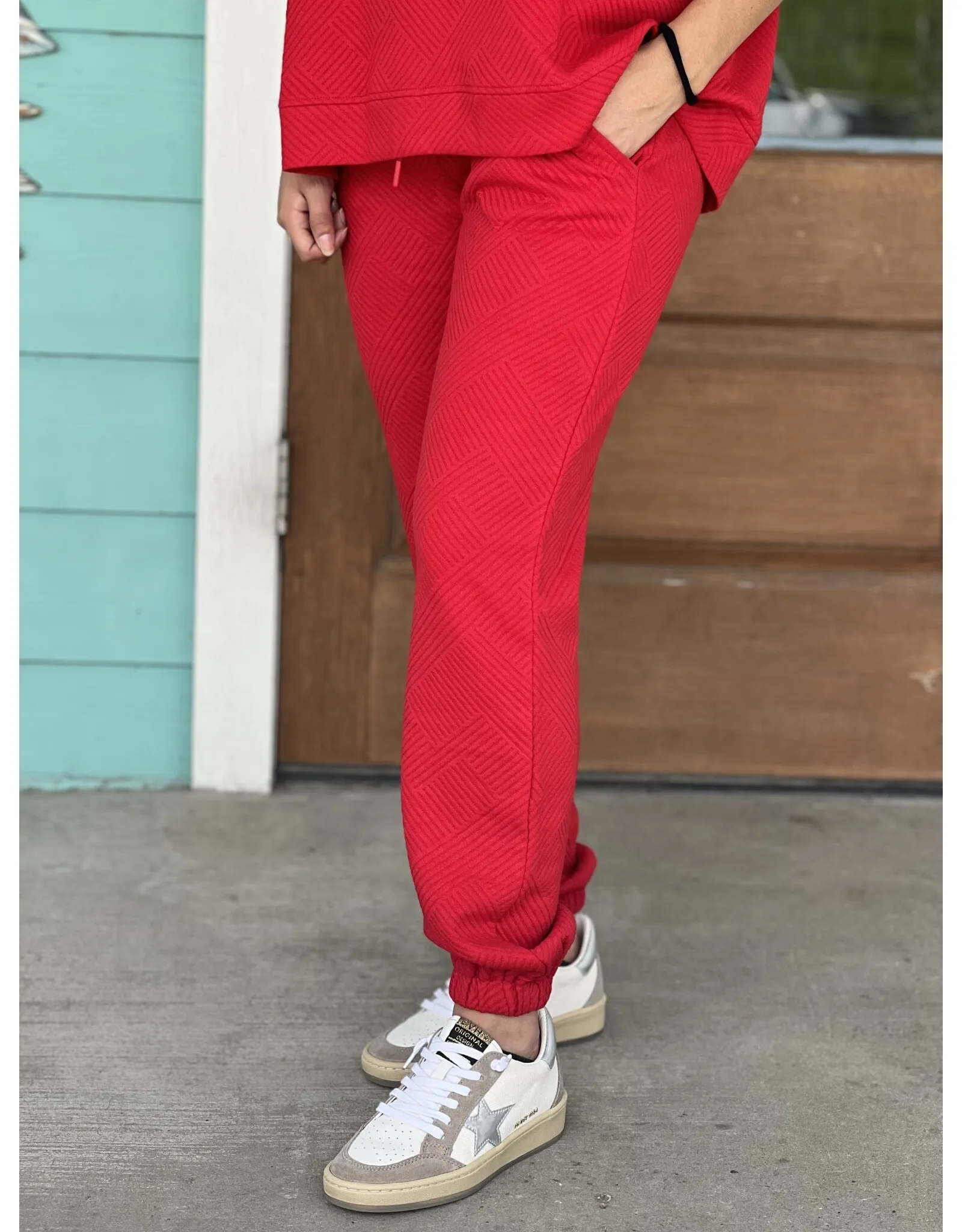 Red Textured Jogger Pants